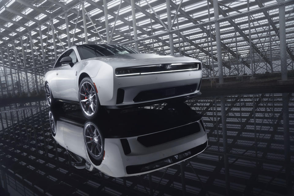 The all electric 2024 Dodge Charger Daytona Scat Pack, shown here in a photo released by Stellantis, delivers 670 horsepower and is expected to reach 0-60 mph in 3.3 seconds. Dodge is unveiling two battery-powered versions of the Charger muscle car that will still roar like a big V8 engine but not emit pollution from the tailpipe. (Stellantis via AP)