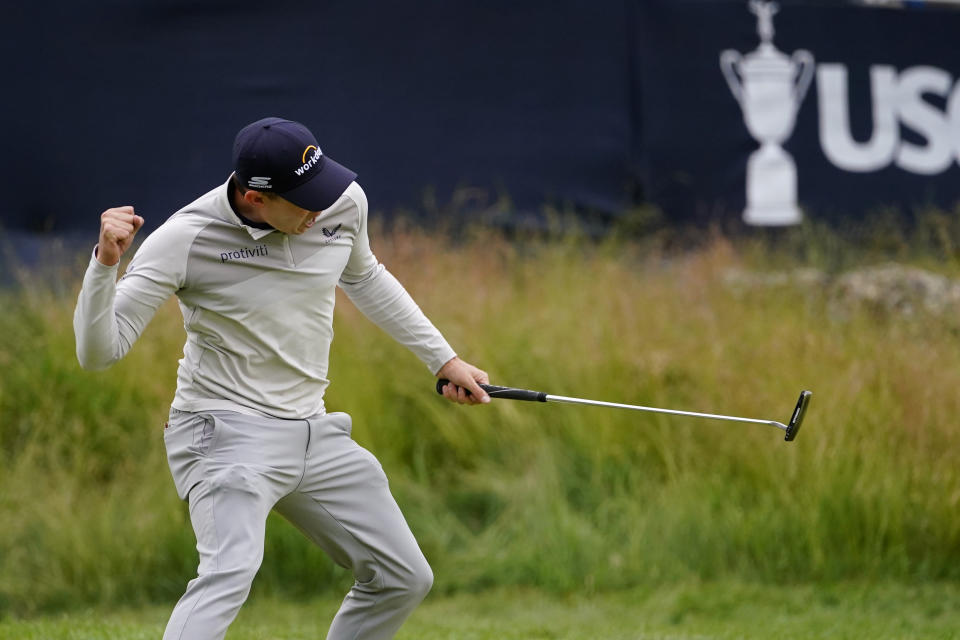 Matthew Fitzpatrick, of England, reacts after a putt on the 13th hole during the final round of the U.S. Open golf tournament at The Country Club, Sunday, June 19, 2022, in Brookline, Mass. (AP Photo/Julio Cortez)