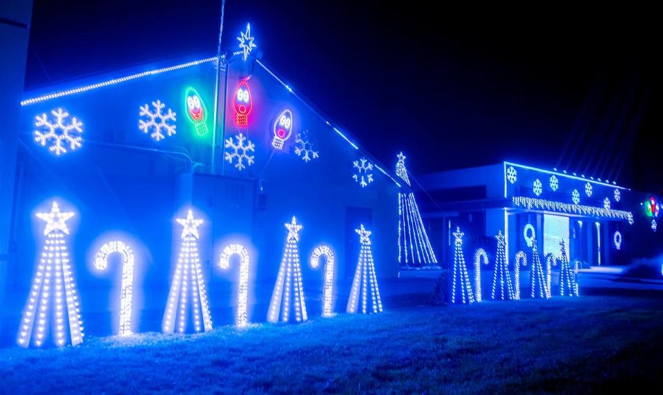 Lincoln Presbyterian Church holds it's 3rd annual Christmas light show in it's parking lot in Stockton on Friday, Dec. 9, 2022.  The church first held the show as a drive-thru event 2020 during the COVID-19 pandemic. "We wanted to do something special" said Pastor Jon Hathorn. "It's a gift from our church fo the community." About 15,000 lights adorn 2 buildings at the church and are synced with a 21-minute musical presentation shown on a loop several times. The church held the show as a walk-up event on Dec. 9 and 10, with refreshments, hay rides, games and crafts for children. On Friday, Dec. 16 and the following 9 days, the church will hold the show as a drive-thru event. 