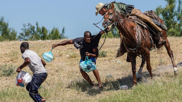 PHOTO: A United States Border Patrol agent on horseback tries to stop a Haitian migrant from entering an encampment on the banks of the Rio Grande near the Acuna Del Rio International Bridge in Del Rio, Texas on Sept. 19, 2021.  (Paul Ratje/AFP via Getty Images, FILE)