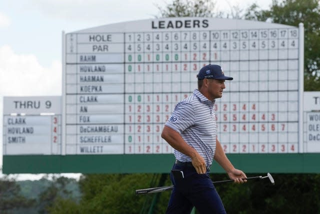 Bryson DeChambeau walks on the 17th green during the first round at the Masters