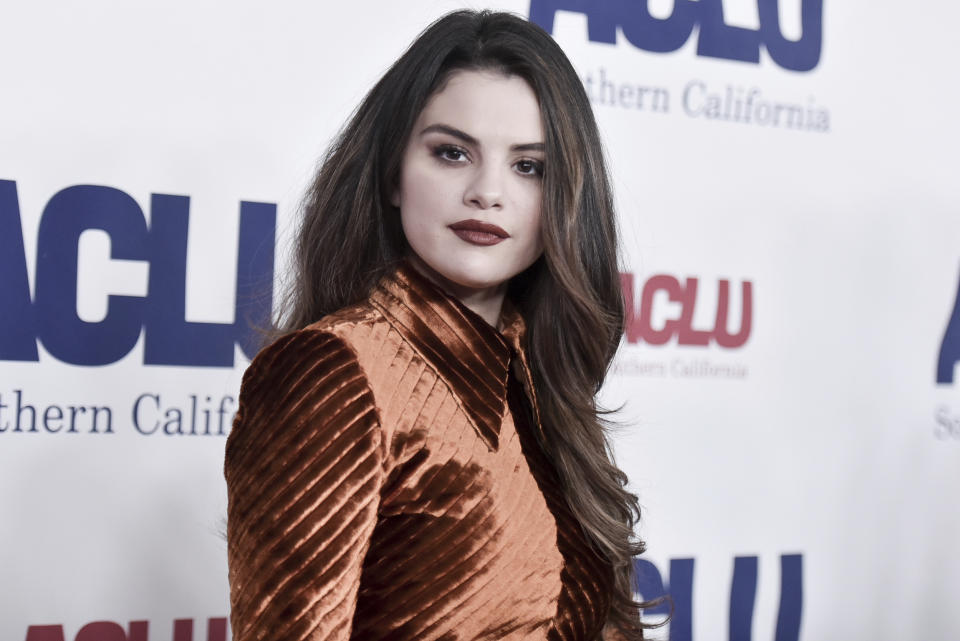 FILE - Selena Gomez attends the 2019 ACLU SoCal's Annual Bill of Rights Dinner in Beverly Hills, Calif. on Nov. 17, 2019. After an angry mob of President Donald Trump supporters took control of the U.S. Capitol in a violent insurrection, Gomez laid much of the blame at the feet of Big Tech. It’s the latest effort by the 28-year-old actress-singer to draw attention to the danger of internet companies critics say have profited from misinformation and hate on their platforms. (Photo by Richard Shotwell/Invision/AP, File)