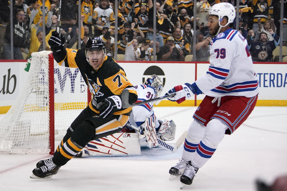 FILE - Pittsburgh Penguins' Evgeni Malkin (71) celebrates after his goal during the second period in Game 6 of an NHL hockey Stanley Cup first-round playoff series against the New York Rangers in Pittsburgh, May 13, 2022. Malkin has decided to go to free agency rather than re-sign with the Penguins before the start of free agency, a person with knowledge of the move said. The person spoke to the The Associated Press on condition of anonymity because neither Malkin nor the Penguins announced the intent for him to go to market. (AP Photo/Gene J. Puskar, File)