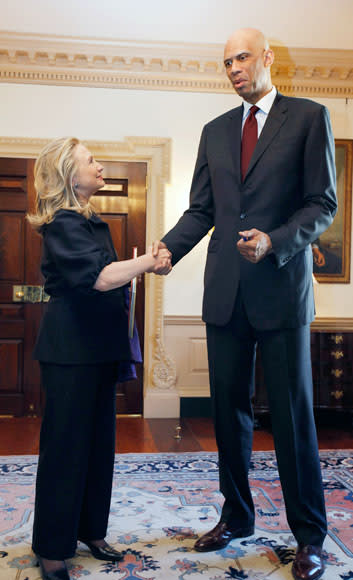 U.S. Secretary of State Hillary Clinton (L) meets with Cultural Ambassador Kareem Abdul Jabbar at the State Department January 18, 2012 in Washington, DC. According to the State Department, Jabbar, a National Basketball Association superstar and hall of fame player, "will lead conversations with young people on the importance of education, social and racial tolerance, cultural understanding, and using sports as a means of empowerment." (Photo by Chip Somodevilla/Getty Images)