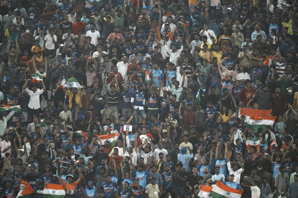 Indian supporters react after Indian won the third T20 cricket match against Australia, in Hyderabad, India, Sunday, Sept. 25, 2022. (AP Photo/Mahesh Kumar A)