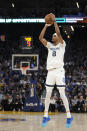 Memphis Grizzlies guard Ziaire Williams shoots a 3-point basket against the Golden State Warriors during the first half of an NBA basketball game in San Francisco, Wednesday, Jan. 25, 2023. (AP Photo/Godofredo A. Vásquez)