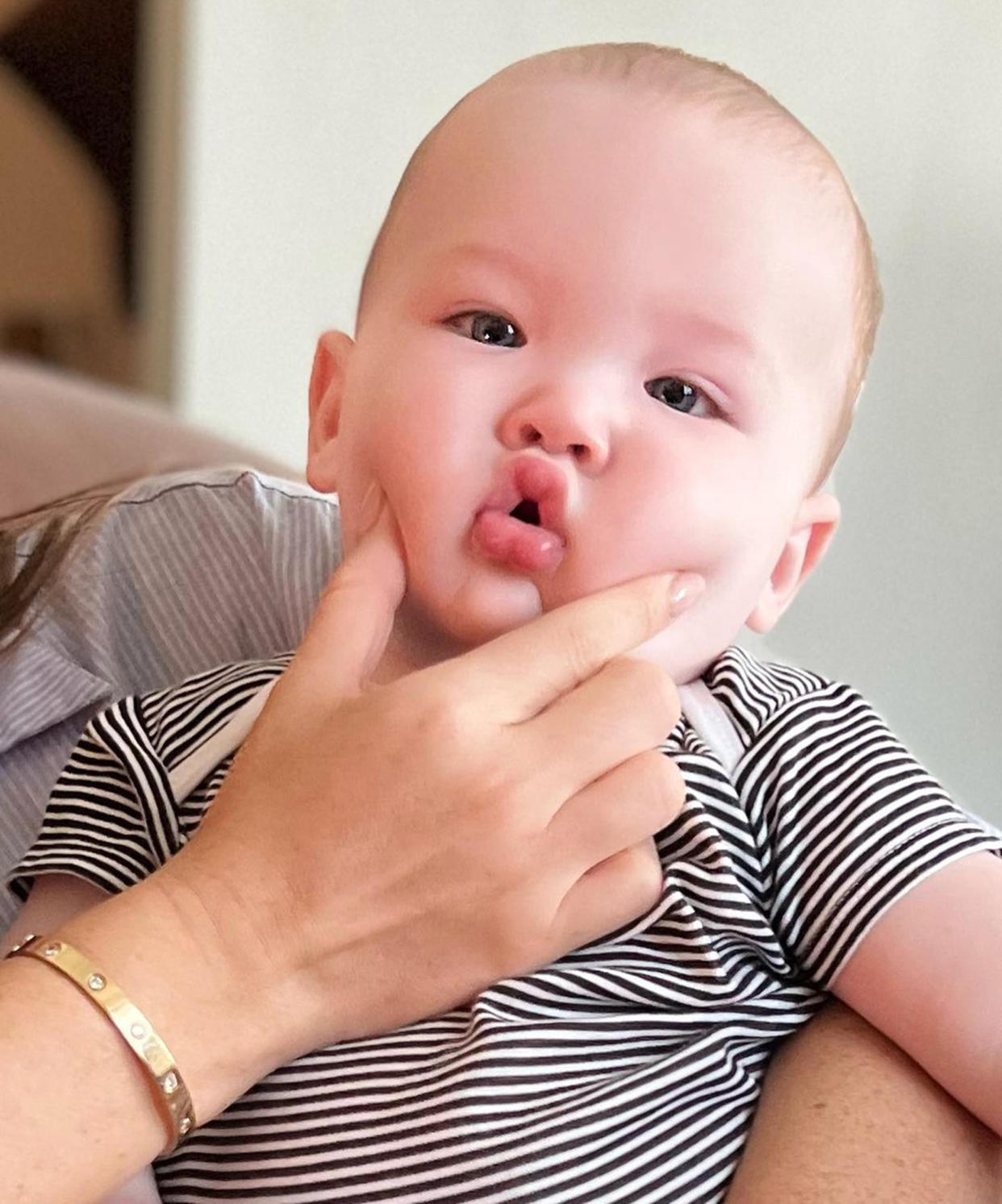 The comment section was flooded with fellow celebrities and fans gushing over baby Malcolm's sweet cheeks. (oliviamunn via Instagram)