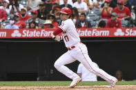 Los Angeles Angels designated hitter Shohei Ohtani hits a single in the sixth inning of a baseball game against the Seattle Mariners, Sunday, Sept. 26, 2021, in Anaheim, Calif. The Mariners won 5-1. (AP Photo/Michael Owen Baker)