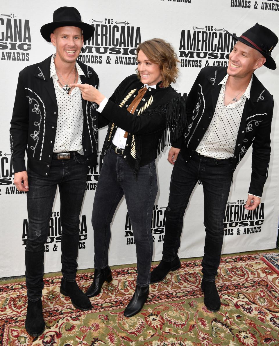 Brandi Carlile and The Twins on the red carpet at the Americana Music Honors & Awards on Wednesday.