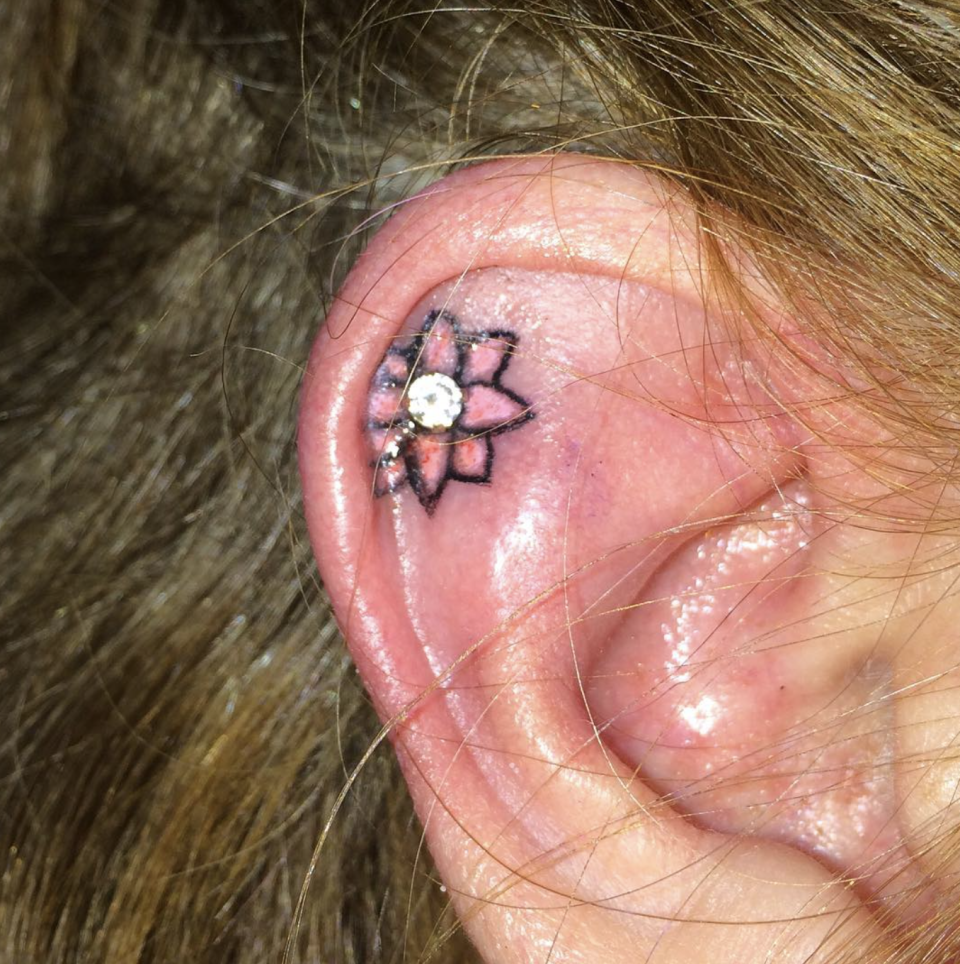 Jazz up our cartilage piercing with a tattoo? Yes please