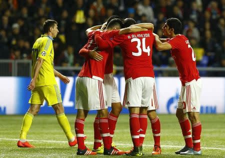 Football Soccer - Astana v Benfica - Champions League Group Stage - Group C - Astana Arena, Astana, Kazakhstan - 25/11/15 Benfica's players celebrate scoring a goal for Astana with Raul Jimenez REUTERS/Shamil Zhumatov