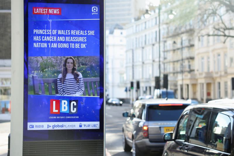 British newspapers with news of Britain's Catherine, Princess of Wales' illness are displayed at a supermarket in London