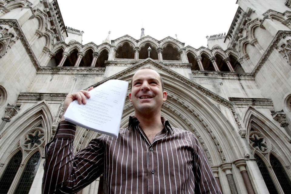 TV and radio presenter Martin Lewis outside the High Court on the bank charges test case judgement day. Charges levied by banks for unauthorised overdrafts are subject to regulation by the Office of Fair Trading under "unfair contract" rules, the High Court ruled today. 