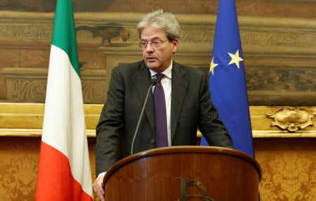 Italian Prime Minister-designate Paolo Gentiloni speaks to journalists at the end of a meeting in the Low Chamber in Rome, Italy December 12, 2016. REUTERS/Remo Casilli