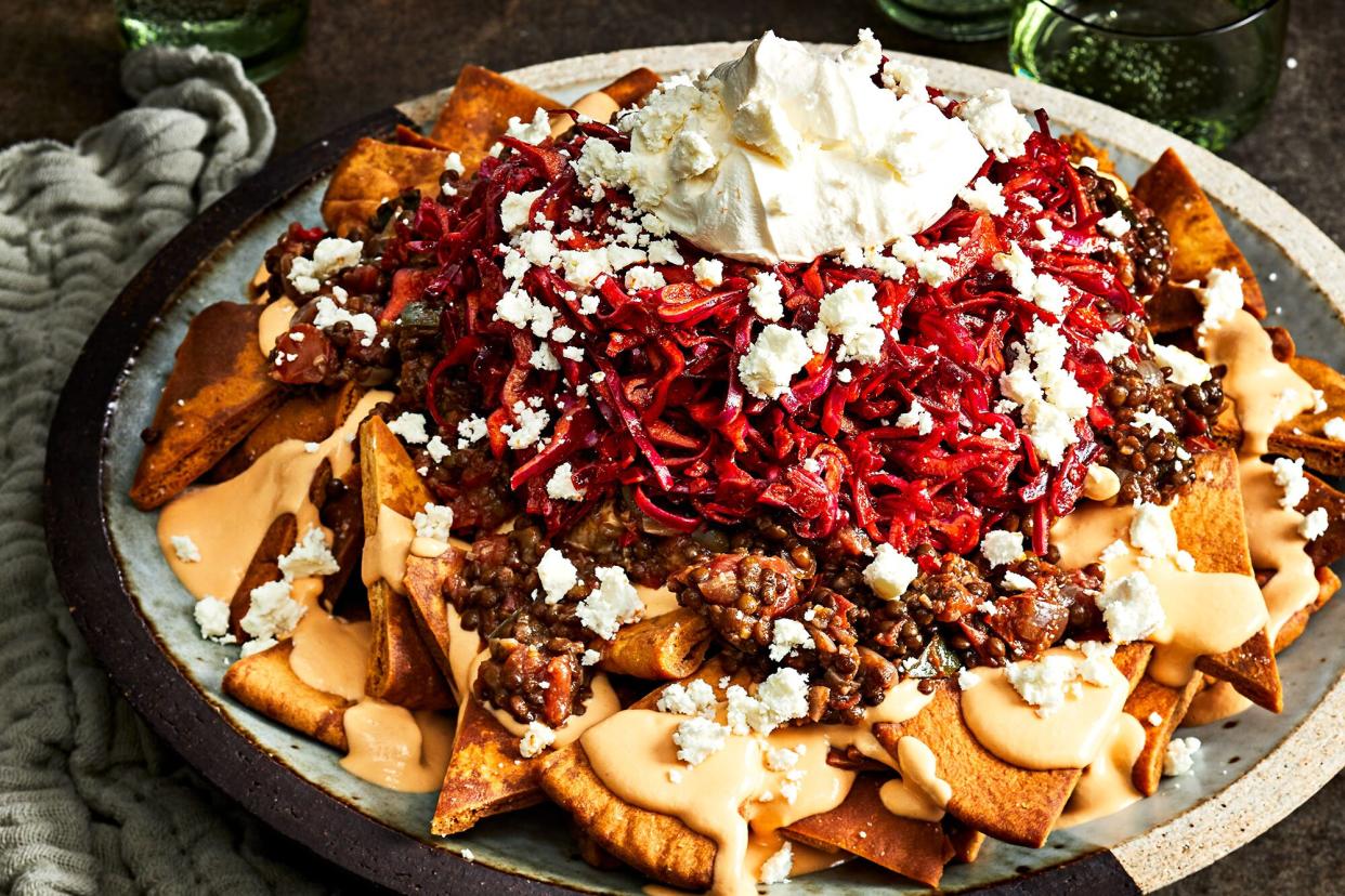 Loaded Pita Nachos with Lentil Chili and Feta Queso