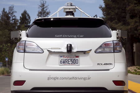 The rear of a Lexus SUV equipped with Google self-driving sensors is seen during a media preview of Google's prototype autonomous vehicles in Mountain View, California September 29, 2015. REUTERS/Elijah Nouvelage