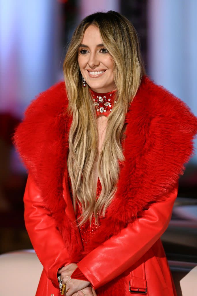 a person wearing a red coat