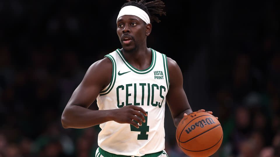 Holiday dribbles during the second half of the Celtics' preseason game against the New York Knicks. - Maddie Meyer/Getty Images