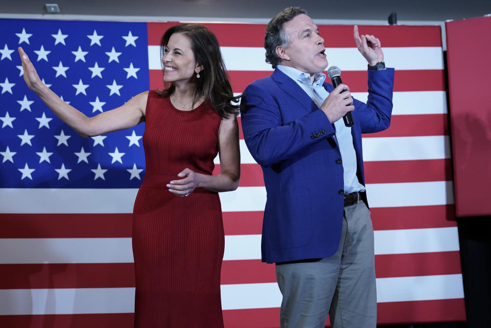 Republican candidate for a Pennsylvania U.S. Senate seat, Dave McCormick, right, and his wife Dinah Powell, talk to supporters as returns show a close race during his returns watch party in the Pennsylvania primary election, Tuesday, May 17, 2022, in Pittsburgh. (AP Photo/Keith Srakocic)