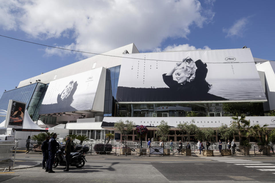 The official poster featuring actress Catherine Deneuve from the film 'La Chamade' is pictured on the facade of the Palais des Festivals ahead of the Cannes film festival, in Cannes, southern France, Monday, May 15, 2023. The 76th edition of the film festival runs from May 16 until May 27. (Photo by Vianney Le Caer/Invision/AP)