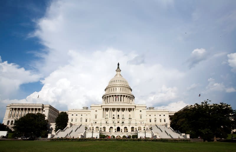 Clouds pass over Capitol Hill in Washington August 1, 2011. Congressional leaders scrambled to line up Republican and Democratic votes for a White House House-backed deal to raise the borrowing limit and avert an unprecedented debt default.</p>
<p> REUTERS/Joshua Roberts    