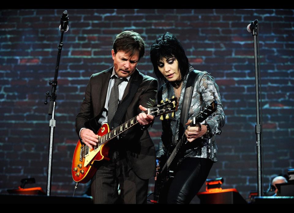 Michael J. Fox and Joan Jett perform onstage at the 2011 A Funny Thing Happened On The Way To Cure Parkinson's event at The Waldorf=Astoria on Nov. 12, 2011 in New York City.  (Dimitrios Kambouris, MJF2011 / WireImage)