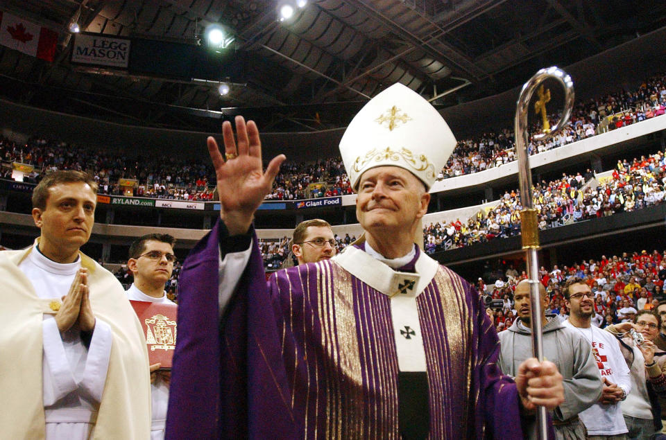 Cardinal Theodore McCarrick waves as he attends a Youth Mass for Life held at the MCI Center in Washington, D.C., January 22, 2004.&nbsp; (Photo: Reuters Photographer / Reuters)