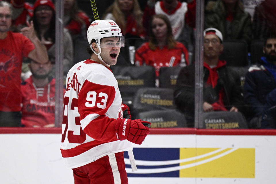 Detroit Red Wings right wing Alex DeBrincat (93) celebrates his goal during the second period of an NHL hockey game against the Washington Capitals, Tuesday, March 26, 2024, in Washington. (AP Photo/Nick Wass)