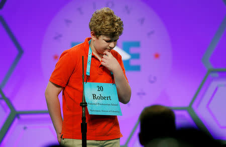 Robert Foster of Kensington, Maryland ponders a word during the Scripps National Spelling Bee at National Harbor in Maryland, U.S. May 30, 2018. REUTERS/Kevin Lamarque