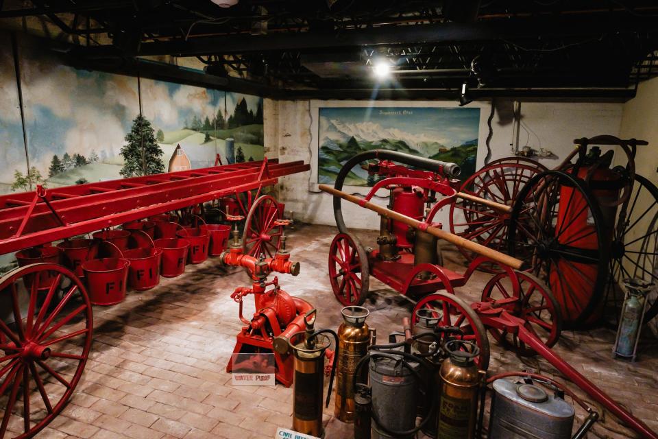 Antique fire apparatus can be seen in the basement of Sugarcreek's Alpine Hills Museum.