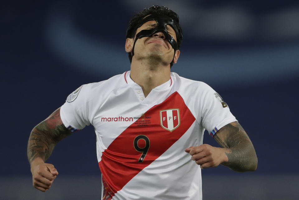 Peru's Gianluca Lapadula reacts during a Copa America semifinal soccer match against Brazil at Nilton Santos stadium in Rio de Janeiro, Brazil, Monday, July 5, 2021. (AP Photo/Silvia Izquierdo)