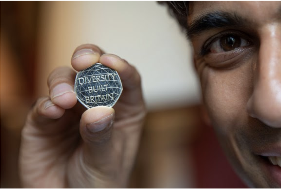 Chancellor Rishi Sunak shows the new 'Diversity Built Britain' 50p coin, which will go into rotation next week. Photo: HM Treasury 