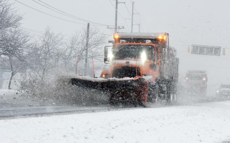 A DelDOT snow plow driver clears Coastal Highway near Rehoboth Beach in 2022.