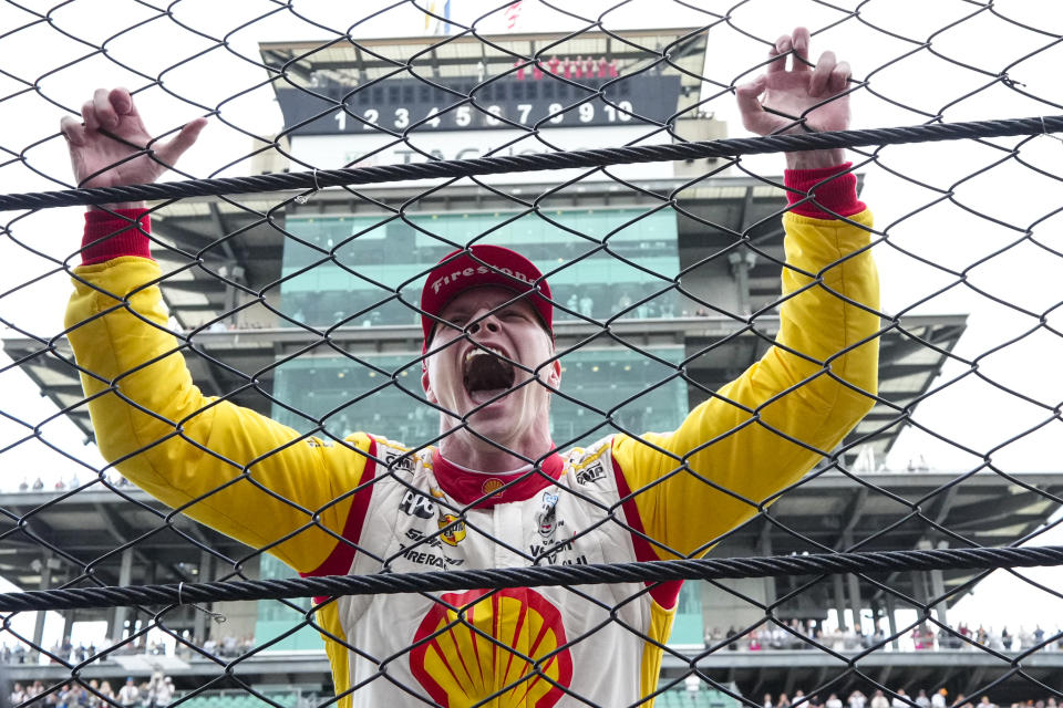 Josef Newgarden celebrates after winning the Indianapolis 500 auto race at Indianapolis Motor Speedway in Indianapolis, Sunday, May 26, 2024. (AP Photo/AJ Mast)