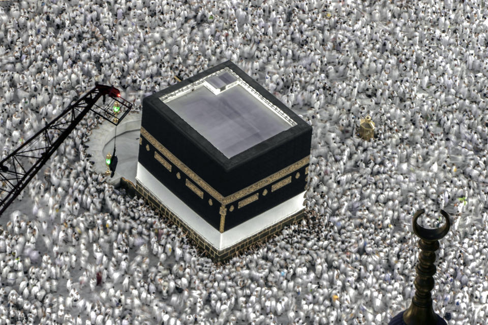 Muslim pilgrims circumambulate around the Kaaba, the cubic building at the Grand Mosque, during the annual Hajj pilgrimage in Mecca, Saudi Arabia, Thursday, June 22, 2023. Muslim pilgrims are converging on Saudi Arabia's holy city of Mecca for the largest Hajj since the coronavirus pandemic severely curtailed access to one of Islam's five pillars. (AP Photo/Amr Nabil)