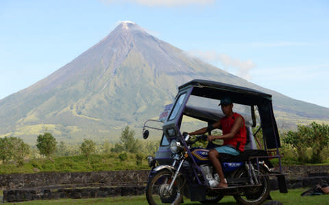 An archive photo of the Mayon volcano when not at risk of eruption  - Credit: AFP