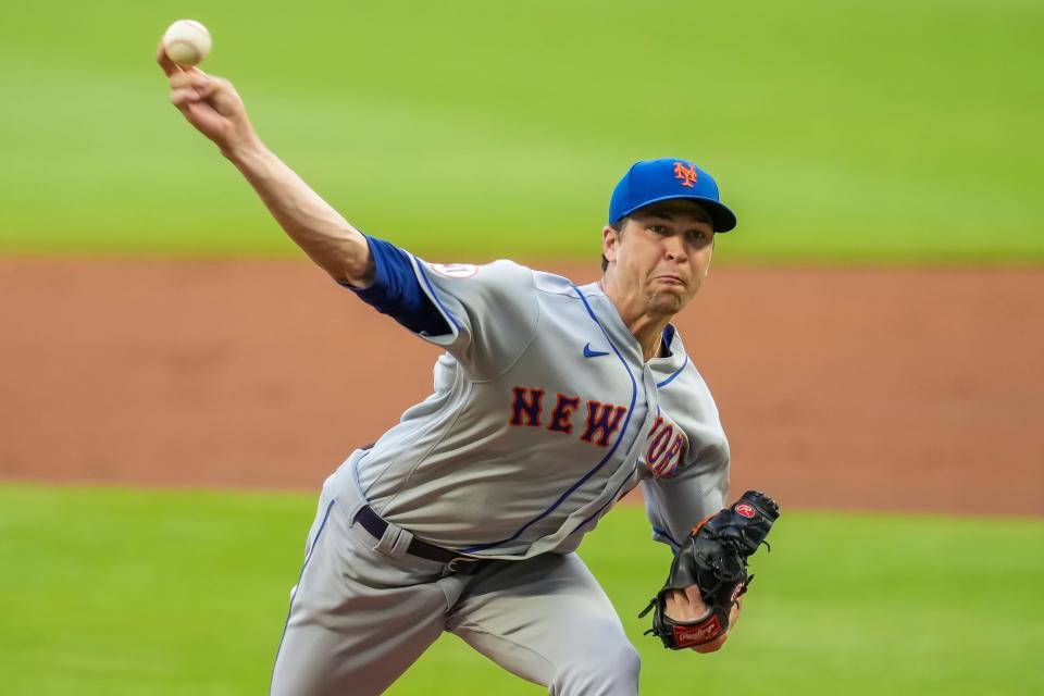 New York Mets starting pitcher Jacob deGrom (48) pitches against the Atlanta Braves during the first inning at Truist Park.