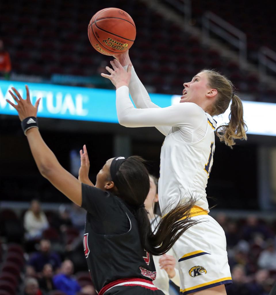 Kent State's Jenna Batsch (12) shoots over Northern Illinois' Jayden Marable (3) during the first half of last week's Mid-American Conference Tournament quarterfinal game.