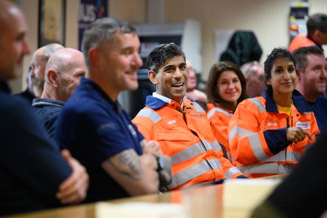 Prime Minister Rishi Sunak and Energy Security and Net Zero Secretary Claire Coutinho speak with crew members in the canteen of the North Sea gas platform