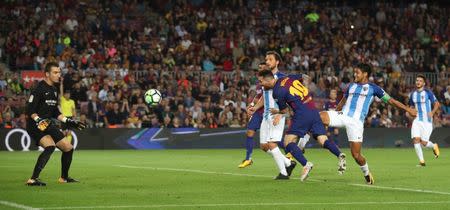 Soccer Football - La Liga Santander - FC Barcelona vs Malaga CF - Camp Nou, Barcelona, Spain - October 21, 2017 Barcelona’s Lionel Messi scores a goal that was disallowed REUTERS/Albert Gea