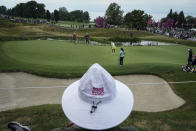 So Yeon Ryu, of South Korea, follows her ball after playing on the 16th hole during the Evian Championship women's golf tournament in Evian, eastern France, Saturday, July 23, 2022. (AP Photo/Laurent Cipriani)