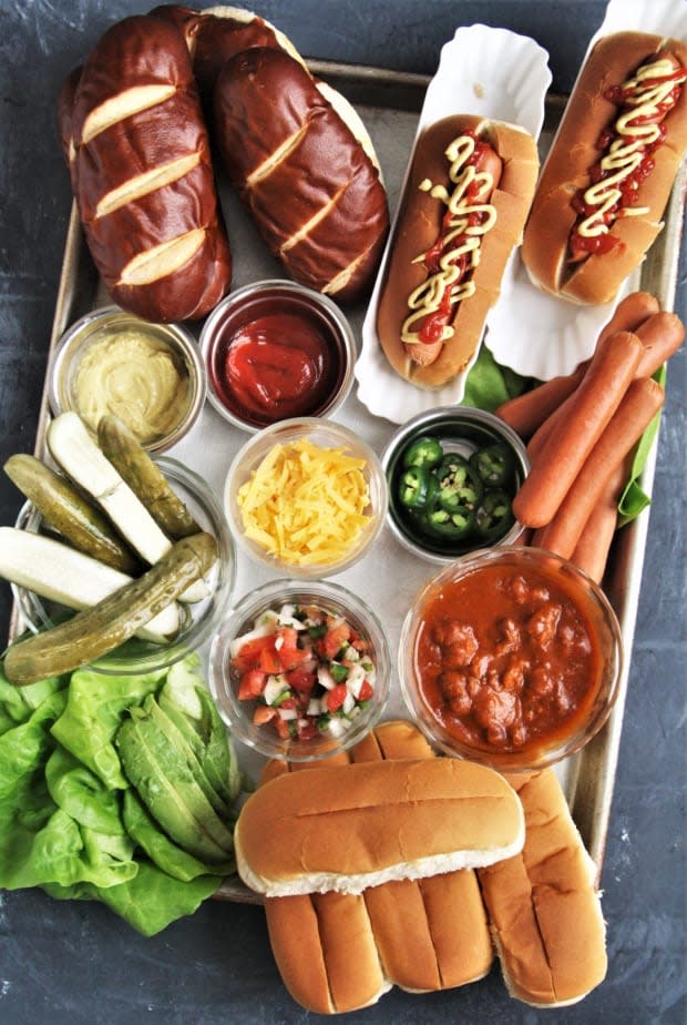 <p><a href="https://www.thetastybiteblog.com/build-your-own-hot-dog-board/" rel="nofollow noopener" target="_blank" data-ylk="slk:The Tasty Bite;elm:context_link;itc:0;sec:content-canvas" class="link ">The Tasty Bite</a></p>