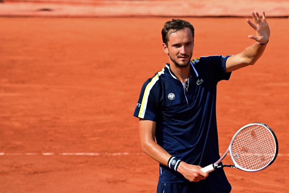 Russia's Daniil Medvedev celebrates after winning against Chile's Christian Garin.