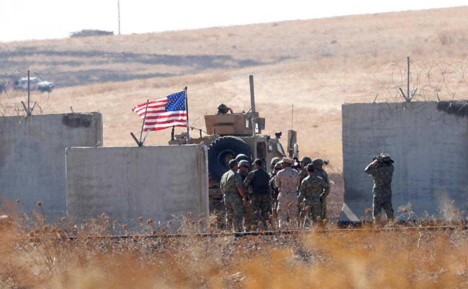 FILE PHOTO: Turkish and U.S. troops meet on the Turkish-Syrian border for a joint U.S.-Turkey patrol in northern Syria, as it is pictured from near the Turkish town of Akcakale, Turkey, September 8, 2019. REUTERS/Murad Sezer/File Photo