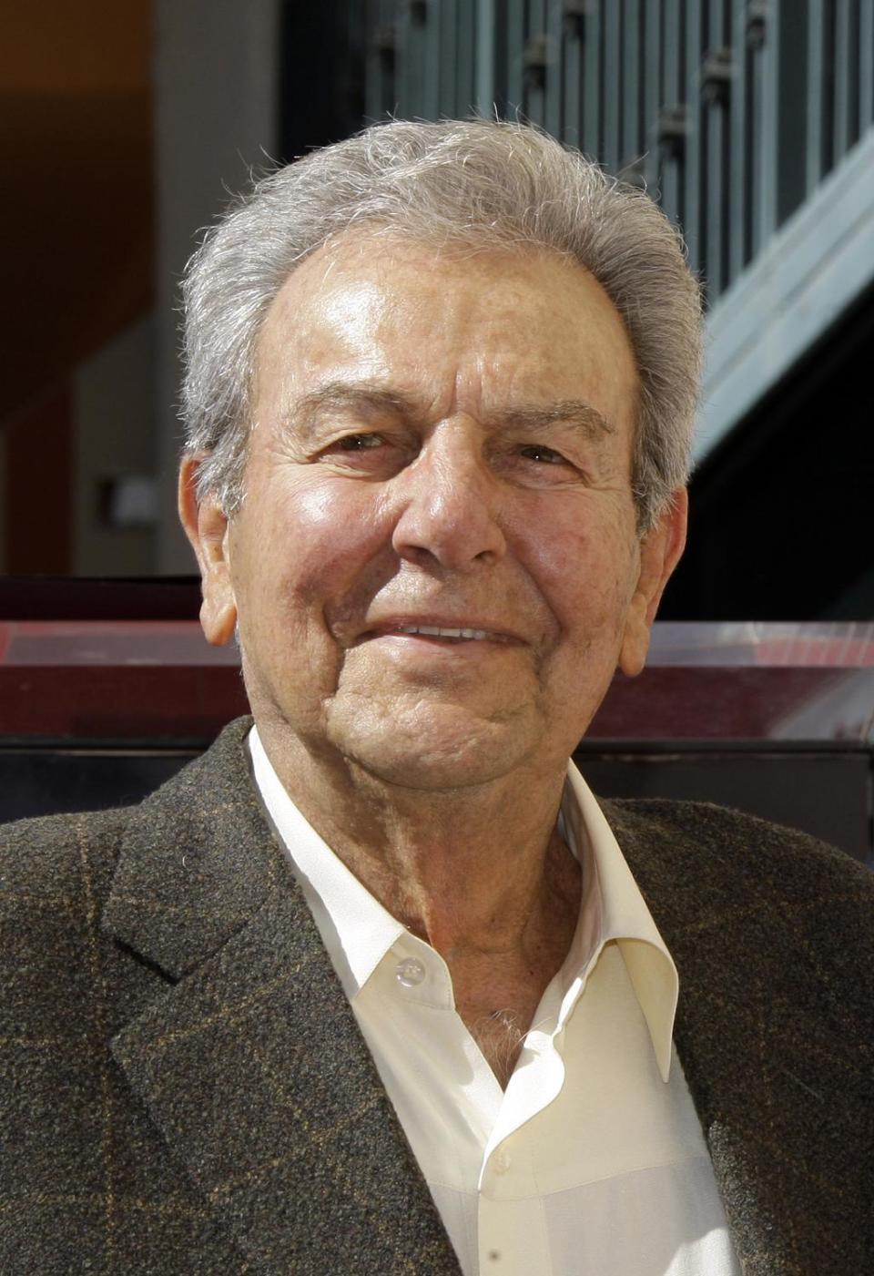 FILE - In this Oct. 30, 2009 file photo, actor Mike Connors is shown at a dedication ceremony for actor Peter Graves' star on the Hollywood Walk of Fame in Los Angeles. Connors, who played a hard-hitting private eye on the long-running TV series "Mannix," has died at age 91. His son-in-law, Mike Condon, says the actor died Thursday afternoon, Jan. 26, 2017, at a Los Angeles hospital from recently-diagnosed leukemia. (AP Photo/Reed Saxon, File)