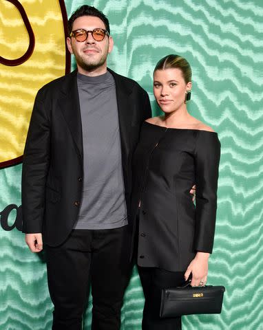 <p>Gregg DeGuire/Billboard via Getty</p> Elliot Grainge and Sofia Richie attend the Warner Music Group 2024 pre-Grammys party.