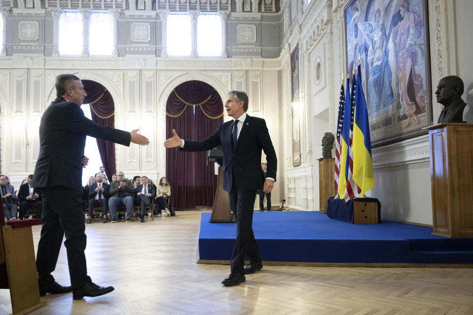 U.S. Secretary of State Antony Blinken, right, leaves the stage after addressing students and and professors in Igor Sikorsky Polytechnic Institute in Kyiv, Ukraine, Tuesday, May 14, 2024. Blinken arrived in Kyiv on Tuesday in an unannounced diplomatic mission to reassure Ukraine that it has American support as it struggles to defend against increasingly intense Russian attacks. (Brendan Smialowski/Pool via AP)