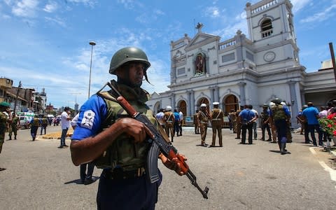 Sri Lankan security forces secure the area around St. Anthony's Shrine - Credit: Getty Images/Getty Images