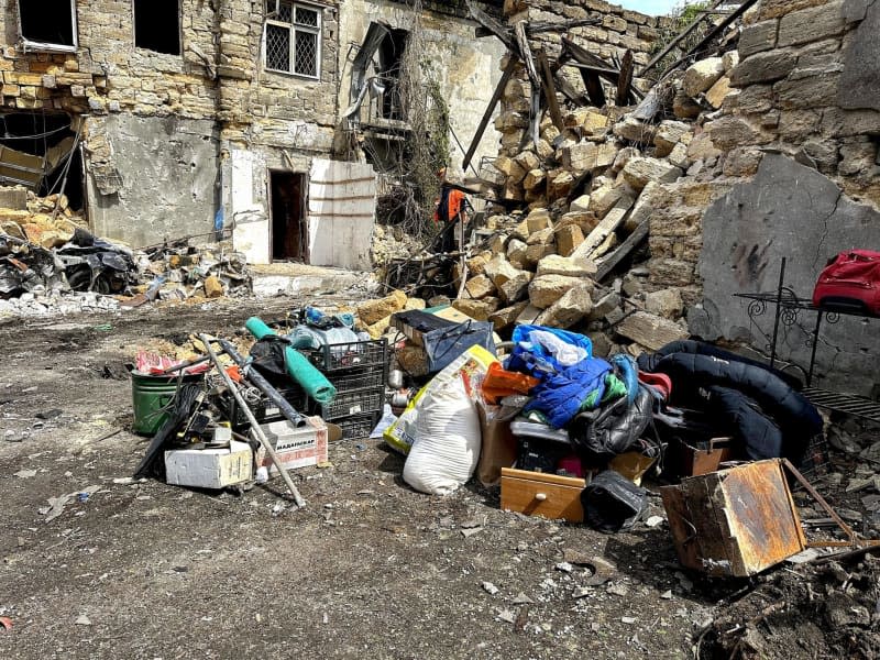 Personal belongings are piled up in front of a house that was damaged in a night-time Russian drone attack. --/https://photonew.ukrinform.com/ Ukrinform/dpa