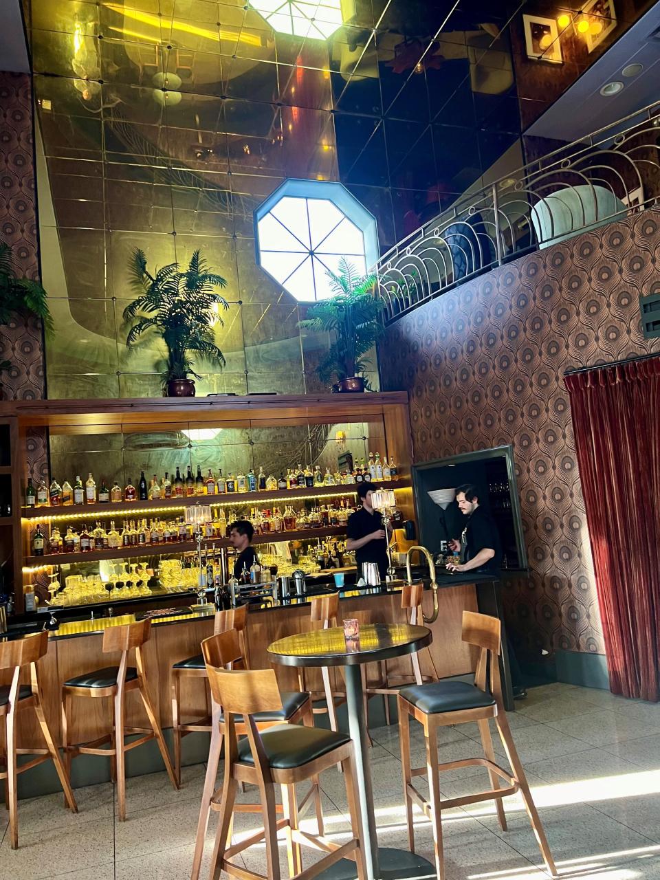 The bar in what was the lobby of converted movie-house restaurant Sinema on March 30, 2024